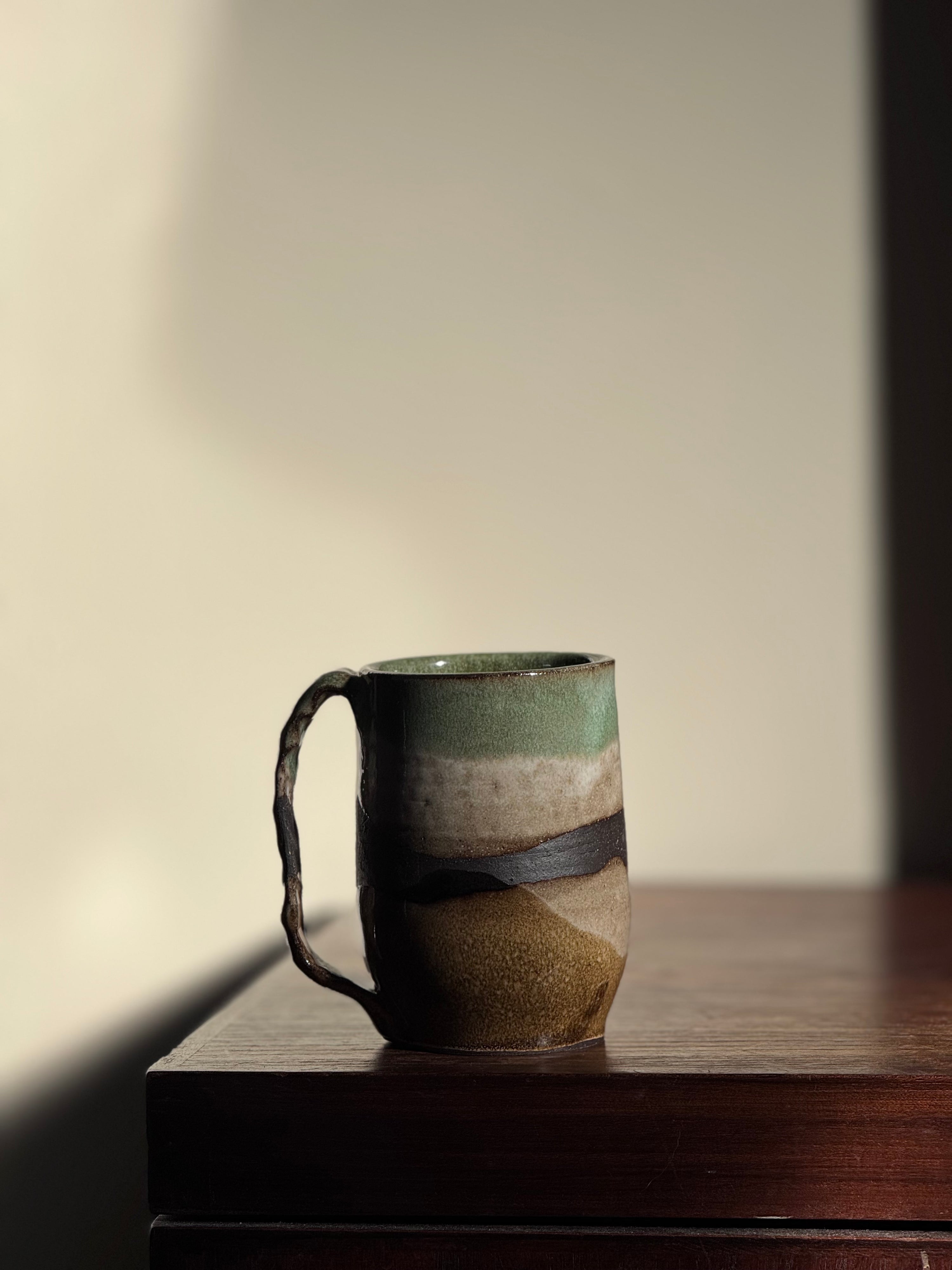 pinched handle mug